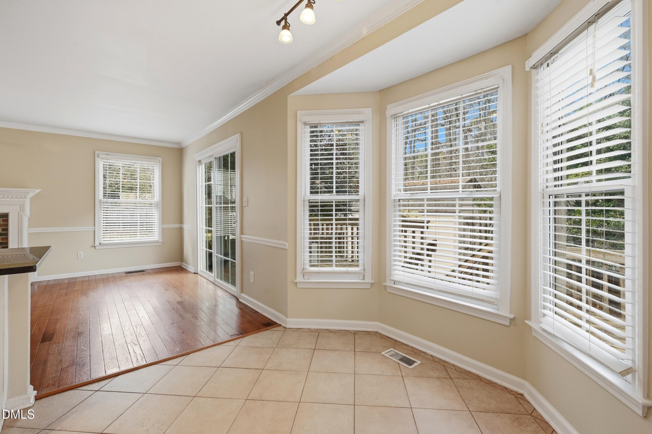 1713 Tealwood Place Raleigh, NC 27615 - Photo 11 of 26 a view of an empty room with a window