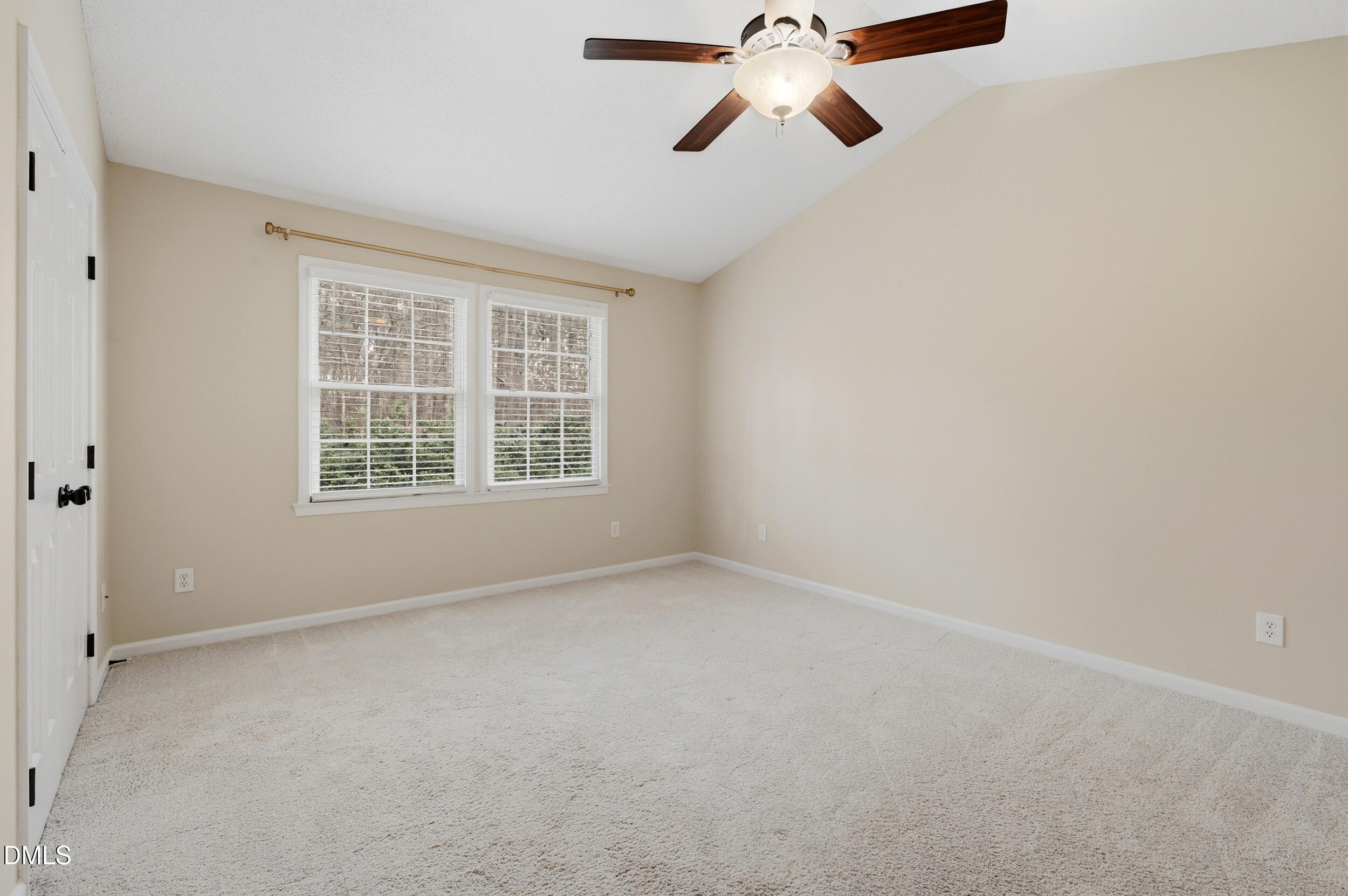 1713 Tealwood Place Raleigh, NC 27615 - Photo 17 of 26 an empty room with a window
