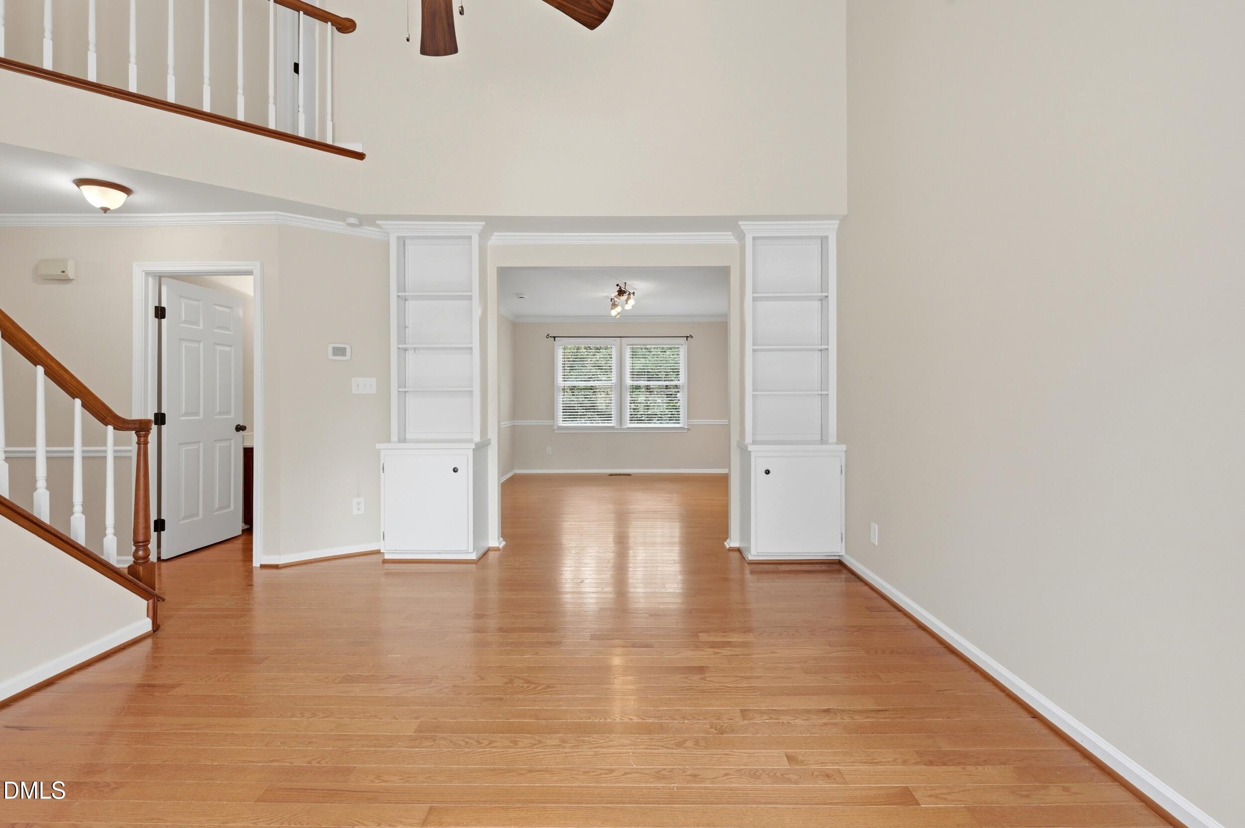 1713 Tealwood Place Raleigh, NC 27615 - Photo 4 of 26 a view of an entryway with wooden floor