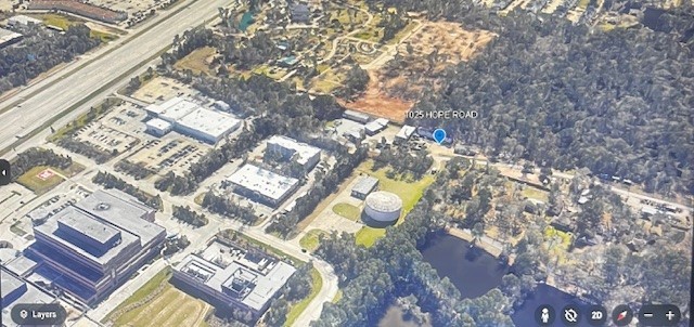 a view of a street with buildings
