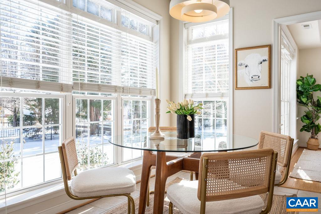 732 Russet Road Crozet, VA 22932 - Photo 15 of 48 a view of a dining room with furniture window and wooden floor