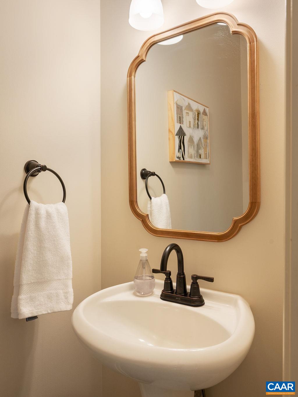 732 Russet Road Crozet, VA 22932 - Photo 22 of 48 a bathroom with a sink and mirror