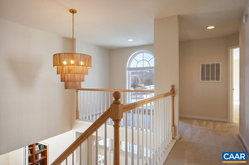 732 Russet Road Crozet, VA 22932 - Photo 25 of 48 a view of a hallway view with chandelier