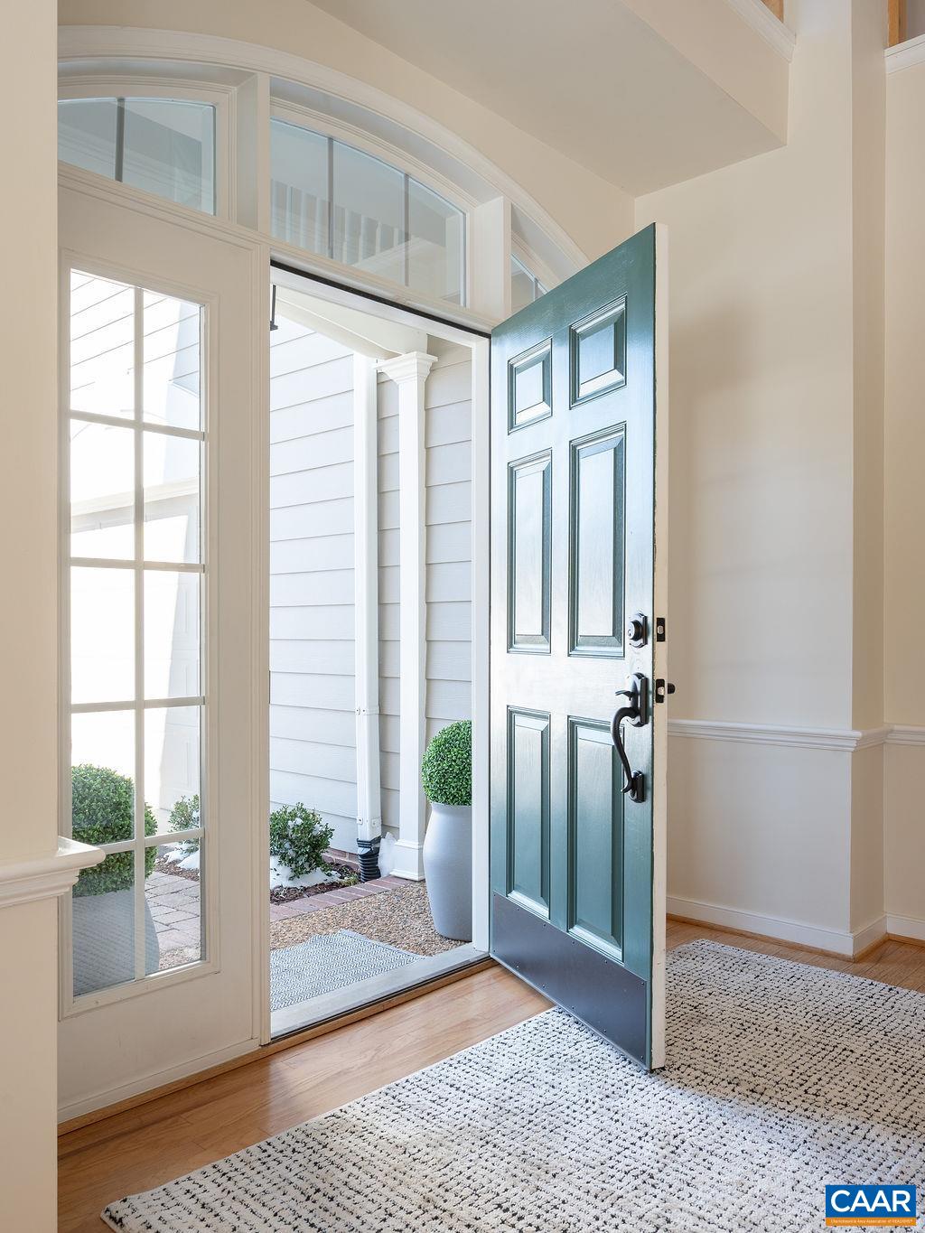 732 Russet Road Crozet, VA 22932 - Photo 4 of 48 a view of a room that has a large window and wooden floor