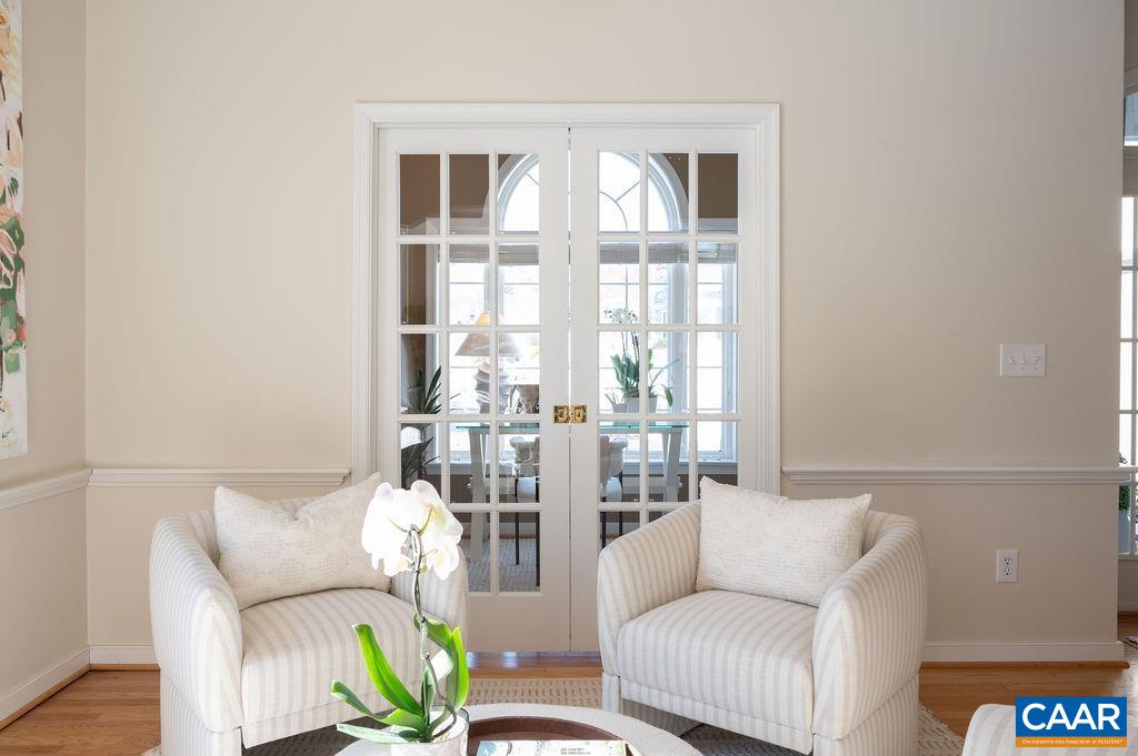 732 Russet Road Crozet, VA 22932 - Photo 10 of 48 a living room with furniture and flower pot
