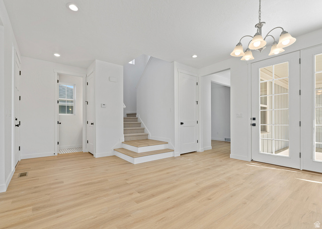 11214 South Easy Bee Road, Unit 270 South Jordan, UT 84009 - Photo 2 of 31 Open concept interior featuring light wood-finish flooring