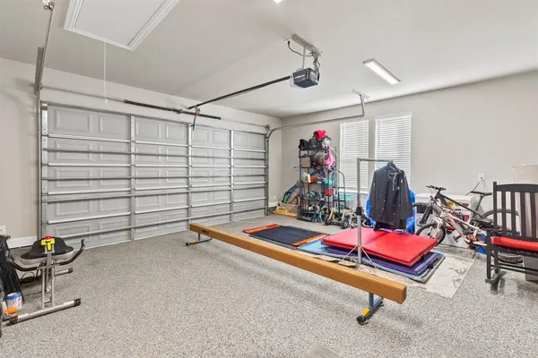 a room with furniture and air hockey table
