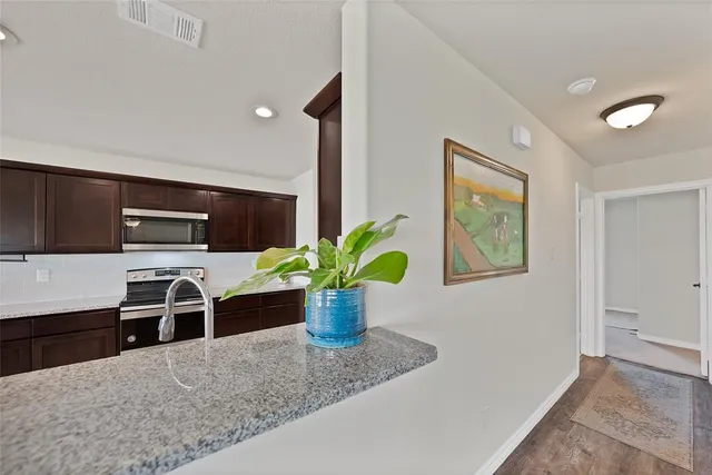 a view of a workspace with furniture