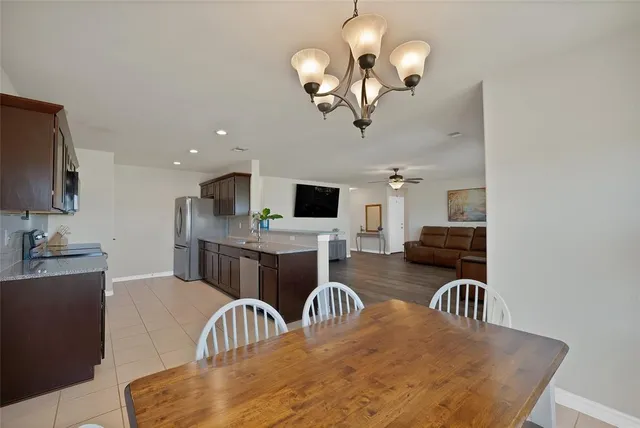 a view of a dining room with furniture