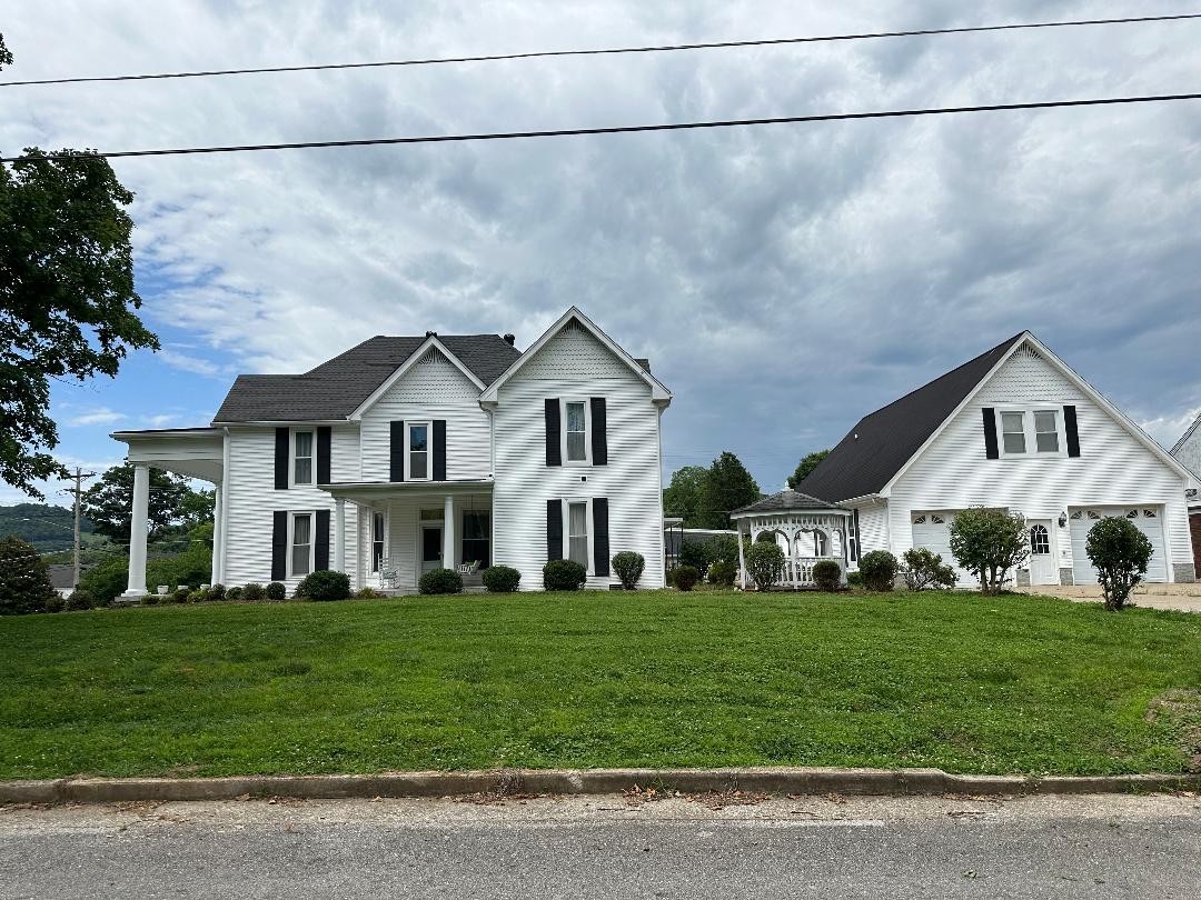 618 Main Street North Carthage, TN 37030 - Photo 3 of 65 a front view of house with yard and green space