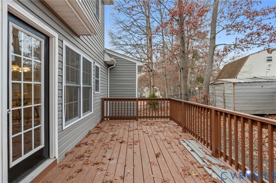 3200 Ludgate Road Chester, VA 23831 - Photo 28 of 33 a view of balcony with wooden floor and fence