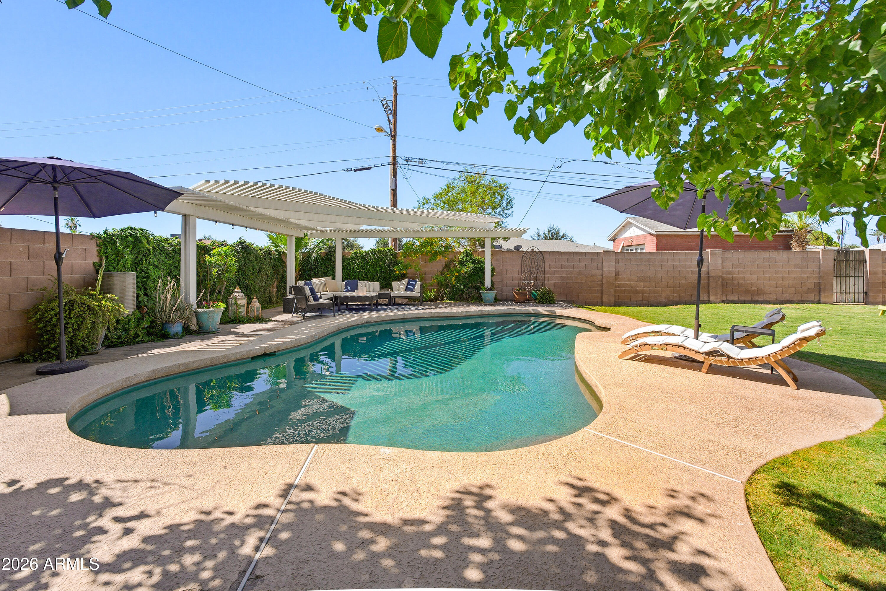 1603 West Rovey Avenue Phoenix, AZ 85015 - Photo 31 of 39 Resort Style Backyard Oasis