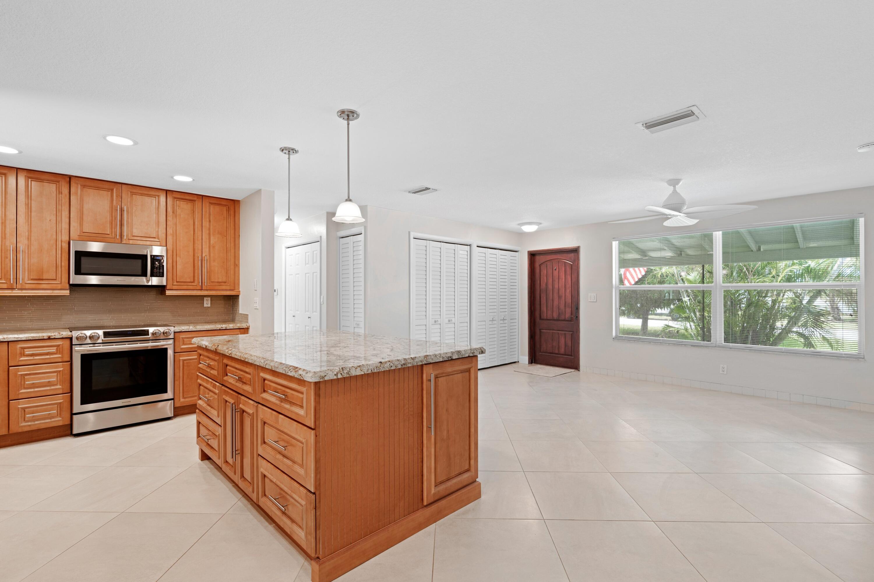 4920 Northwest 2nd Court Boca Raton, FL 33431 - Photo 4 of 29 Kitchen Island