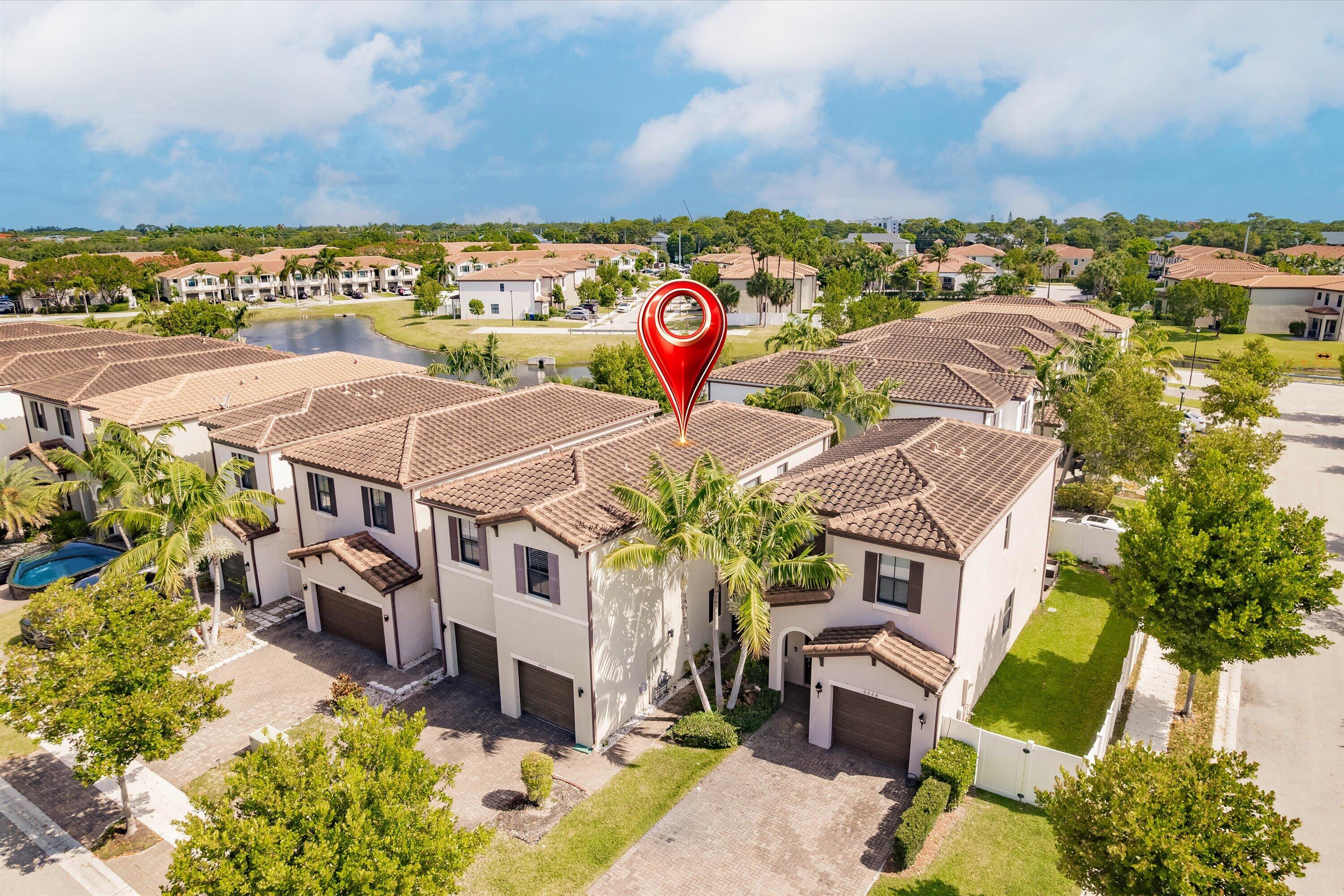 6026 Pine Tree Way, Unit 6026 Riviera Beach, FL 33410 - Photo 30 of 31 27-Aerial Photo 027