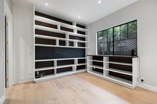 a view of an empty room with a balcony