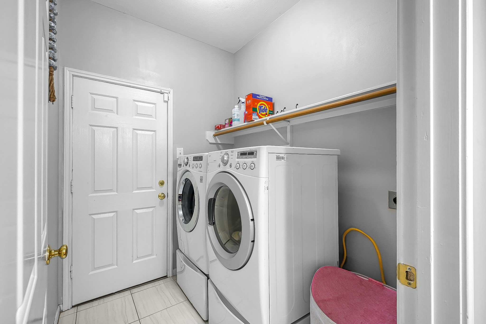 20251 Eden Pines Spring, TX 77379 - Photo 22 of 33 a utility room with dryer and washer
