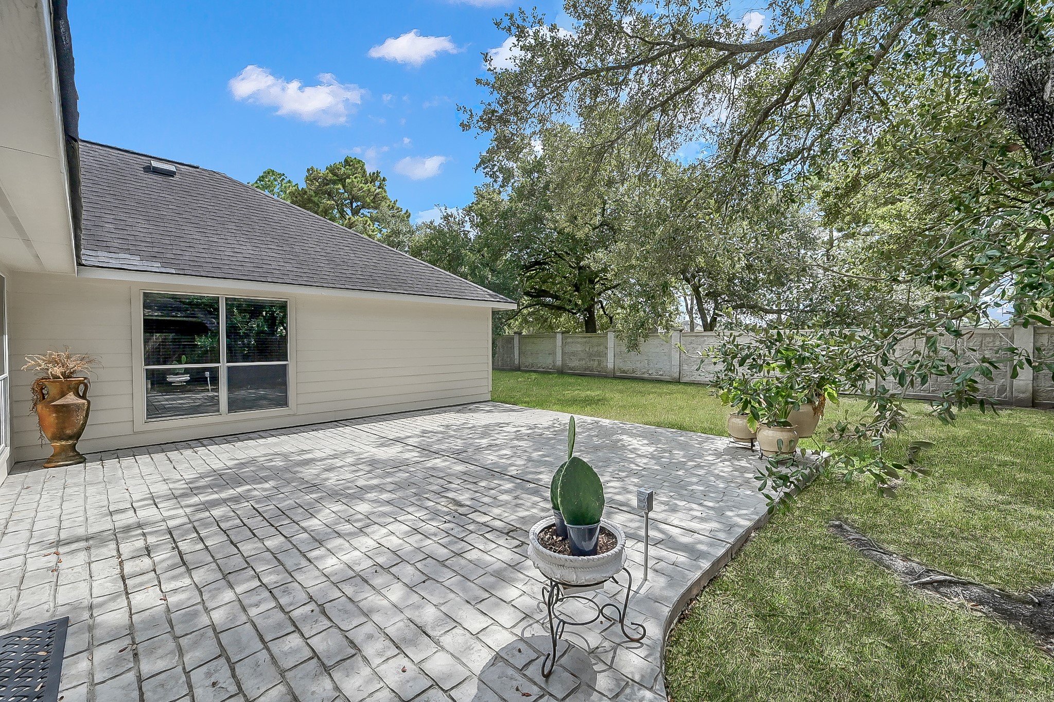 20251 Eden Pines Spring, TX 77379 - Photo 25 of 33 a view of a house with backyard