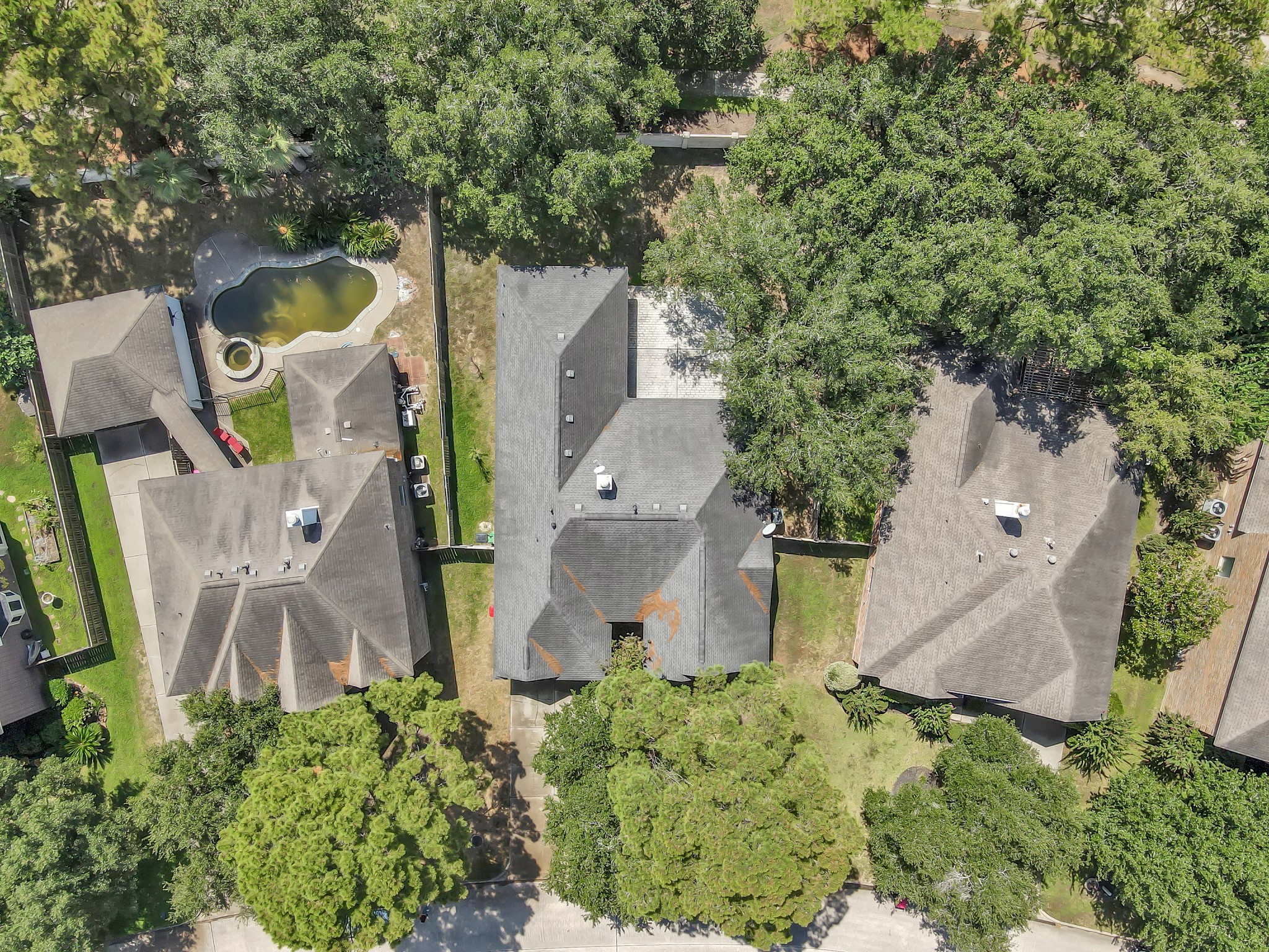 20251 Eden Pines Spring, TX 77379 - Photo 27 of 33 an aerial view of a house with outdoor space and a lake view