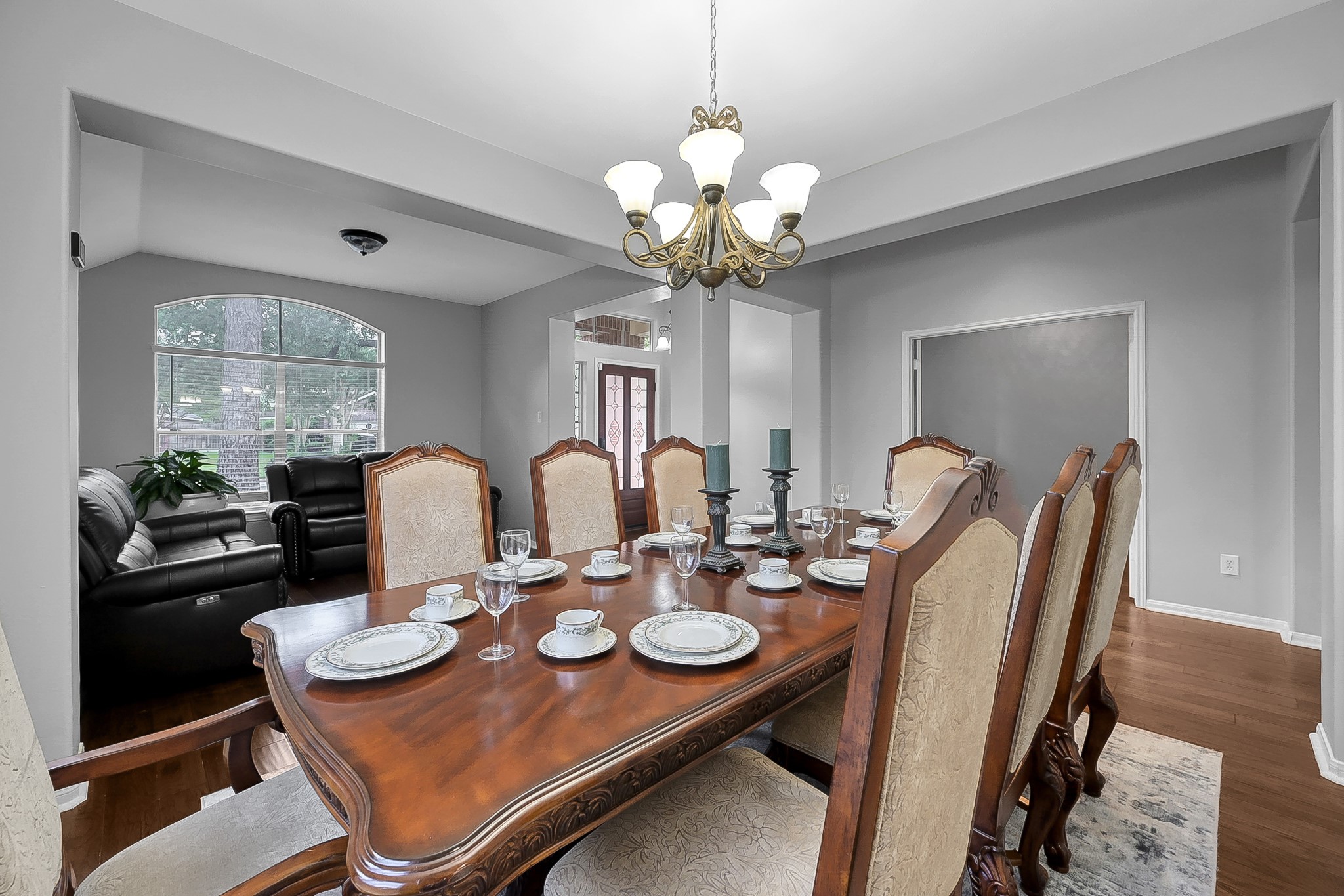 20251 Eden Pines Spring, TX 77379 - Photo 5 of 33 a dining room with furniture and chandelier