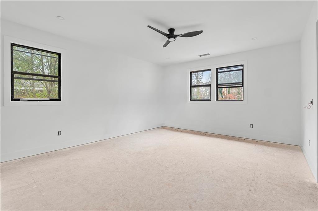 2659 Flat Shoals Road Decatur, GA 30034 - Photo 15 of 20 a view of an empty room with a window