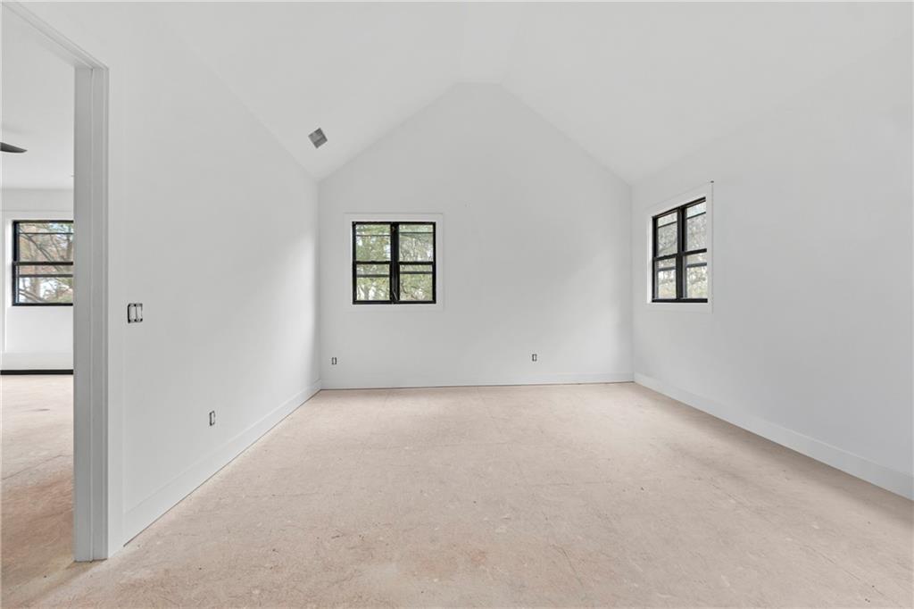 2659 Flat Shoals Road Decatur, GA 30034 - Photo 16 of 20 an empty room with windows and closet