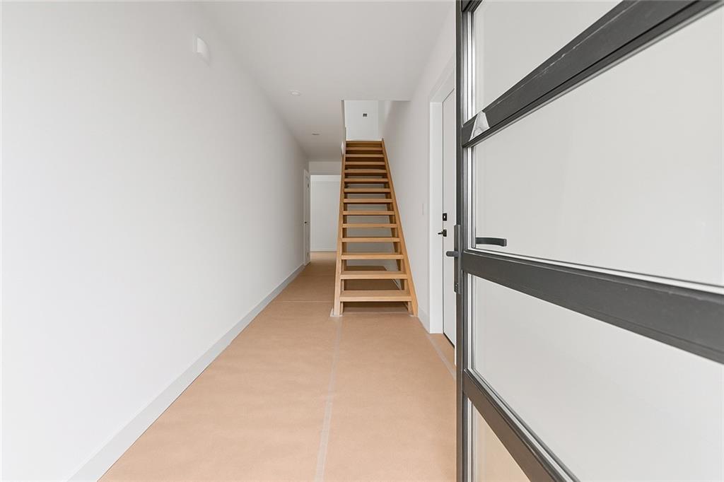 2659 Flat Shoals Road Decatur, GA 30034 - Photo 2 of 20 a view of a hallway with stairs