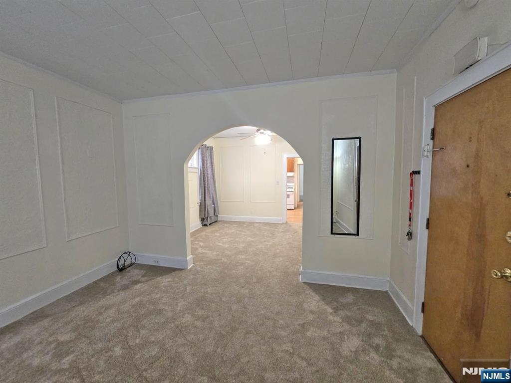 105 North 15th Street Bloomfield, NJ 07003 - Photo 3 of 12 a view of a livingroom with a staircase