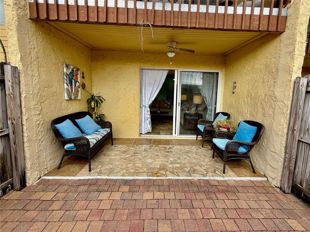 3405 Clark Road, Unit 106 Sarasota, FL 34231 - Photo 17 of 19 a view of a lounge chairs in the patio