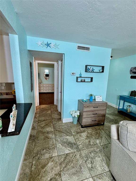 3405 Clark Road, Unit 106 Sarasota, FL 34231 - Photo 10 of 19 a living room with furniture and a couch