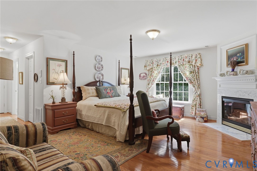 13424 Tipple Point Road Midlothian, VA 23114 - Photo 27 of 53 a bed room with a bed and a chair