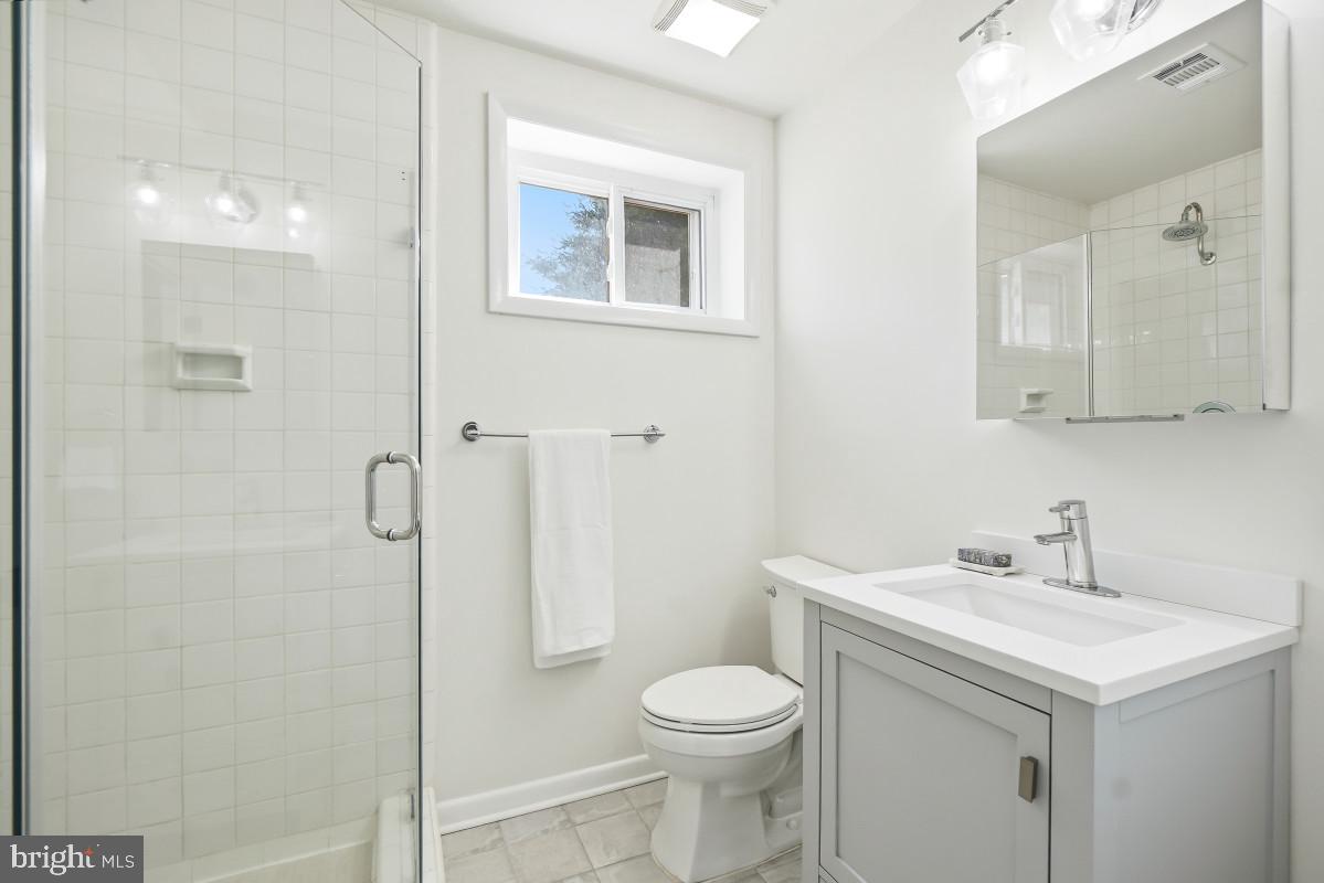 1446 Roxanna Road Northwest Washington, DC 20012 - Photo 25 of 32 Modern bathroom with sleek design.