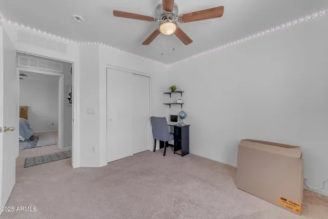 an aerial view of a house with a garden