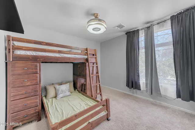 an aerial view of a house with a garden