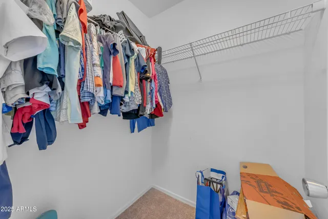 an aerial view of a house with a garden and plants