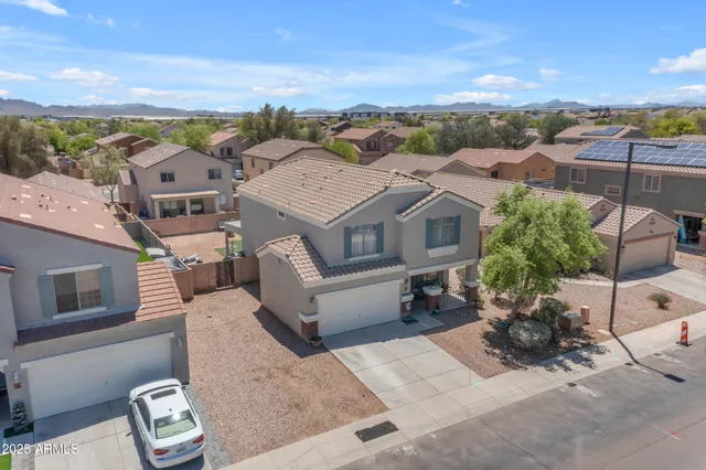 a view of a house with porch and a table