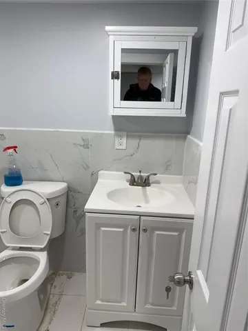 a bathroom with a sink and a toilet