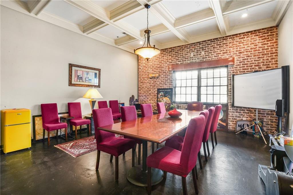 5434 Peachtree Road, Unit 119 Atlanta, GA 30341 - Photo 31 of 44 a view of a dining room with furniture and chandelier