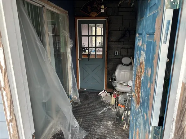 a kitchen with a stove a refrigerator and a sink