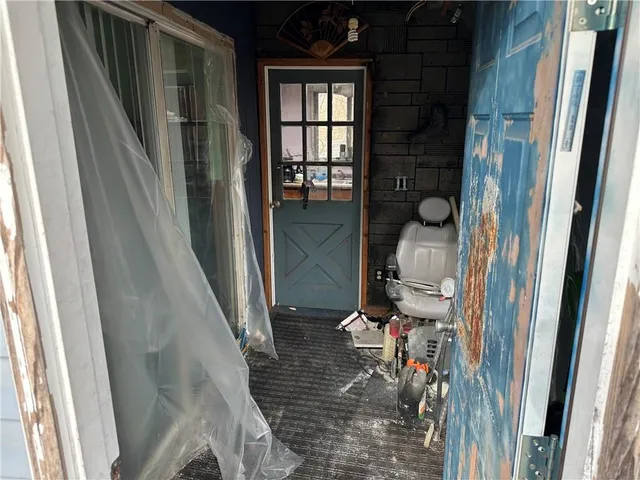 a kitchen with a stove a refrigerator and a sink