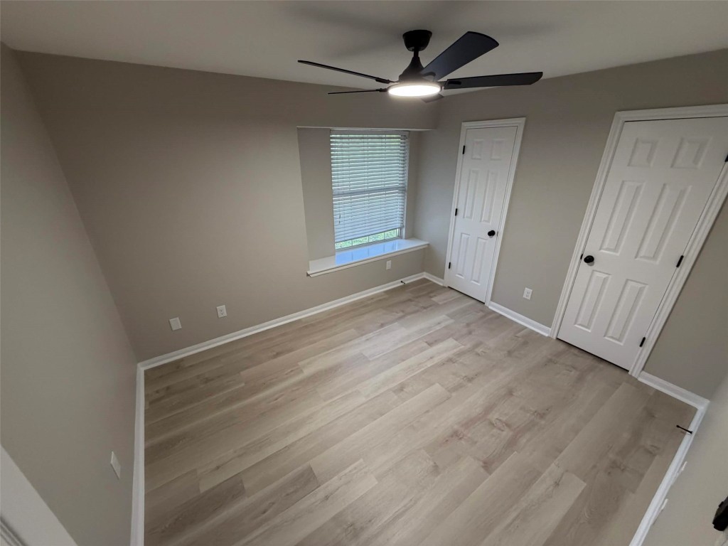 2006 Kilgore Road, Unit 101 Baytown, TX 77520 - Photo 5 of 9 a view of an empty room with a window