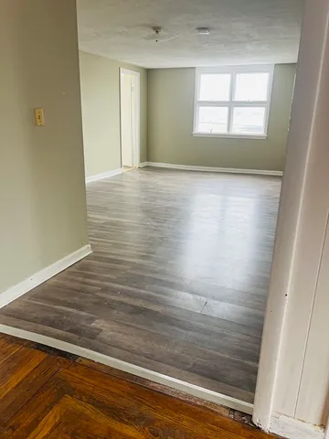 a view of an empty room and window