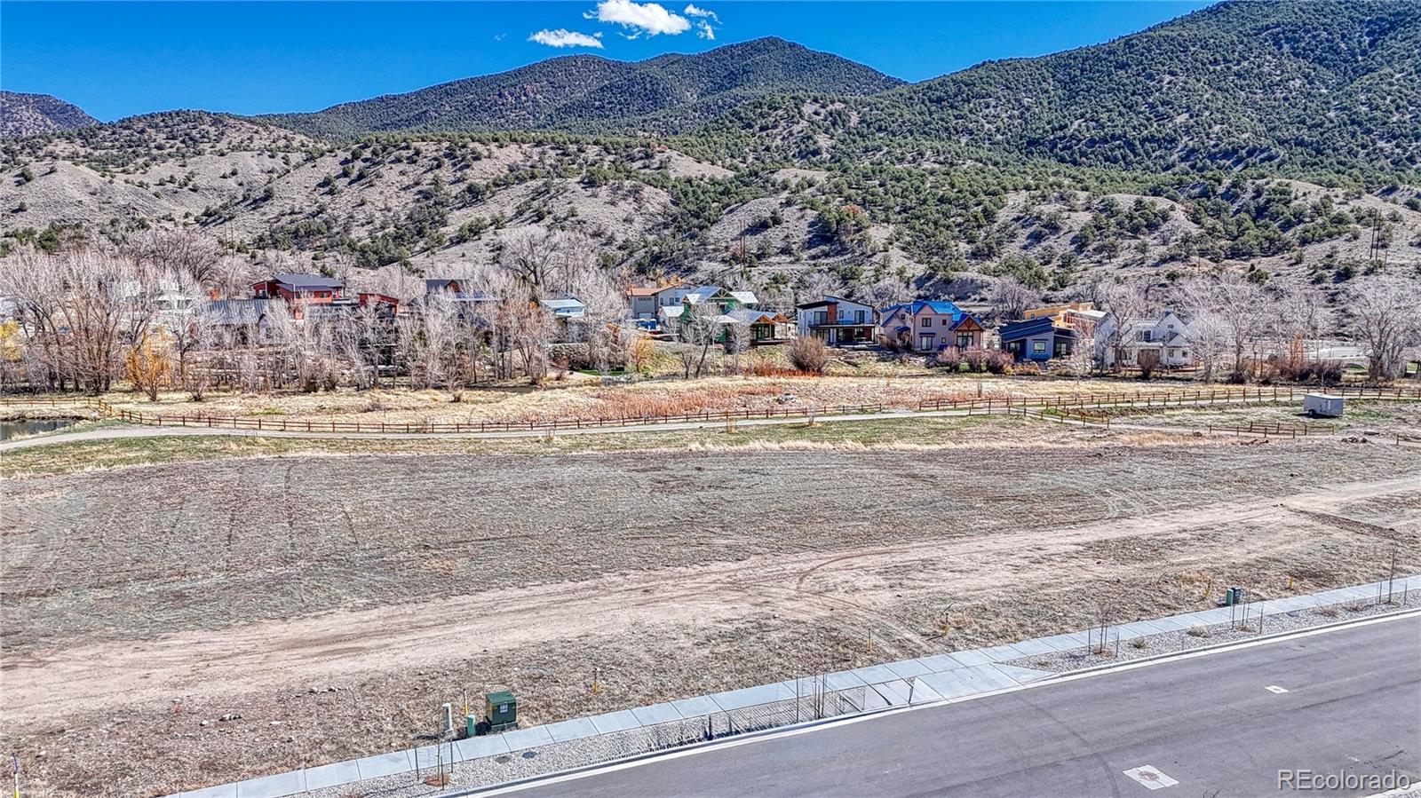 236 Southside Loop Salida, CO 81201 - Photo 12 of 13 a view of a town with mountains in the background