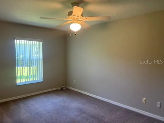 a view of a room with an empty space