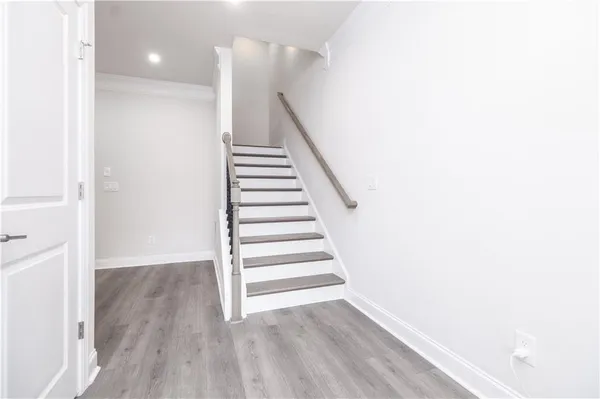 a view of entryway with wooden floor