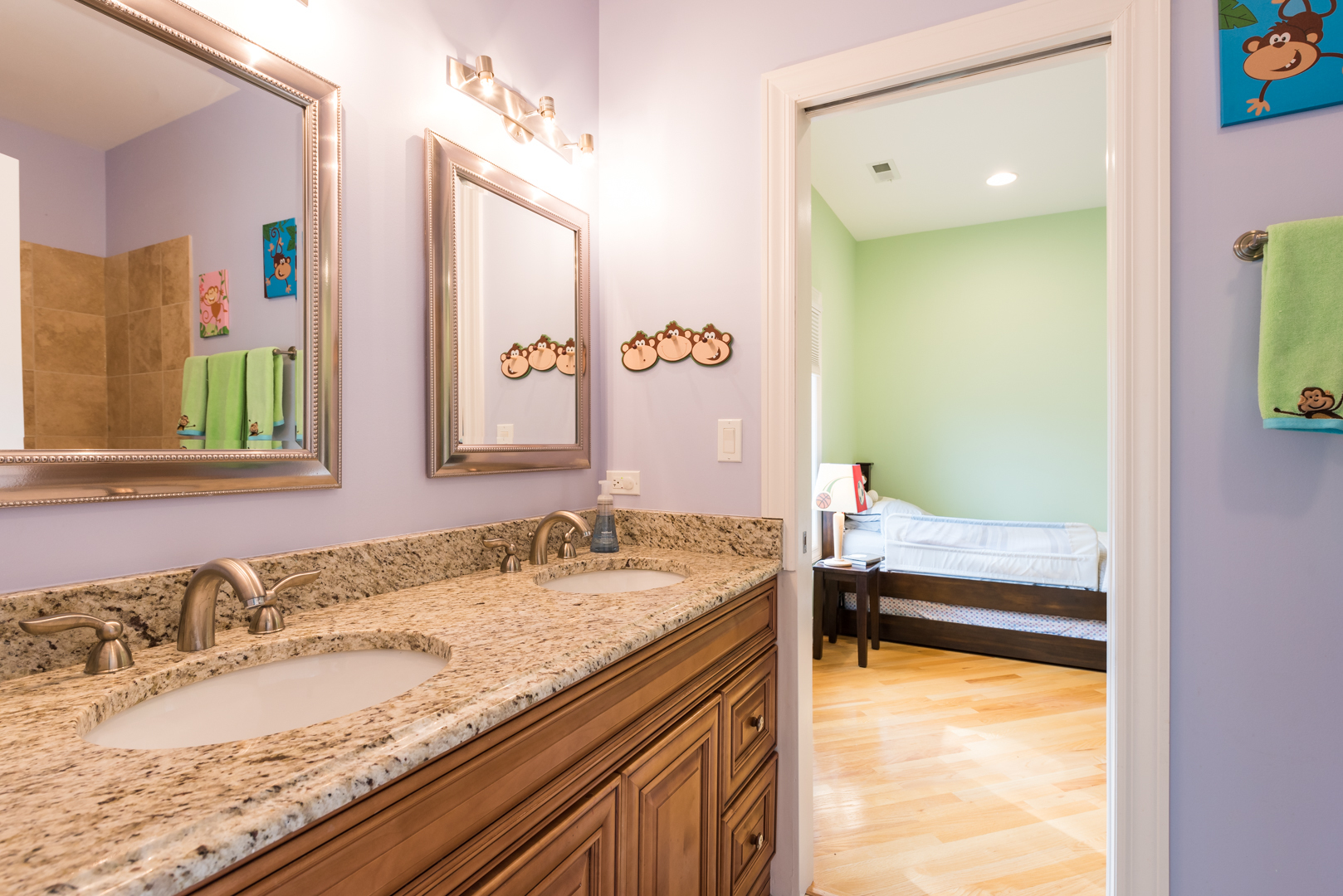 1330 Kenton Road Deerfield, IL 60015 - Photo 18 of 24 a en suite bathroom with a granite countertop sink and a mirror