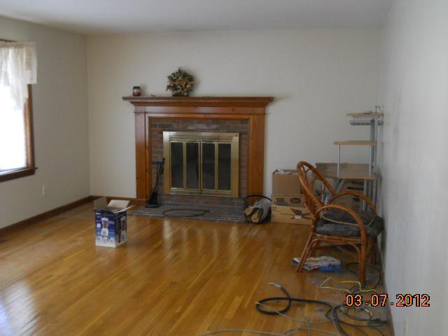 38 Captain Jacs Road Centerville, MA 02632 - Photo 4 of 8 a living room with furniture and a fireplace