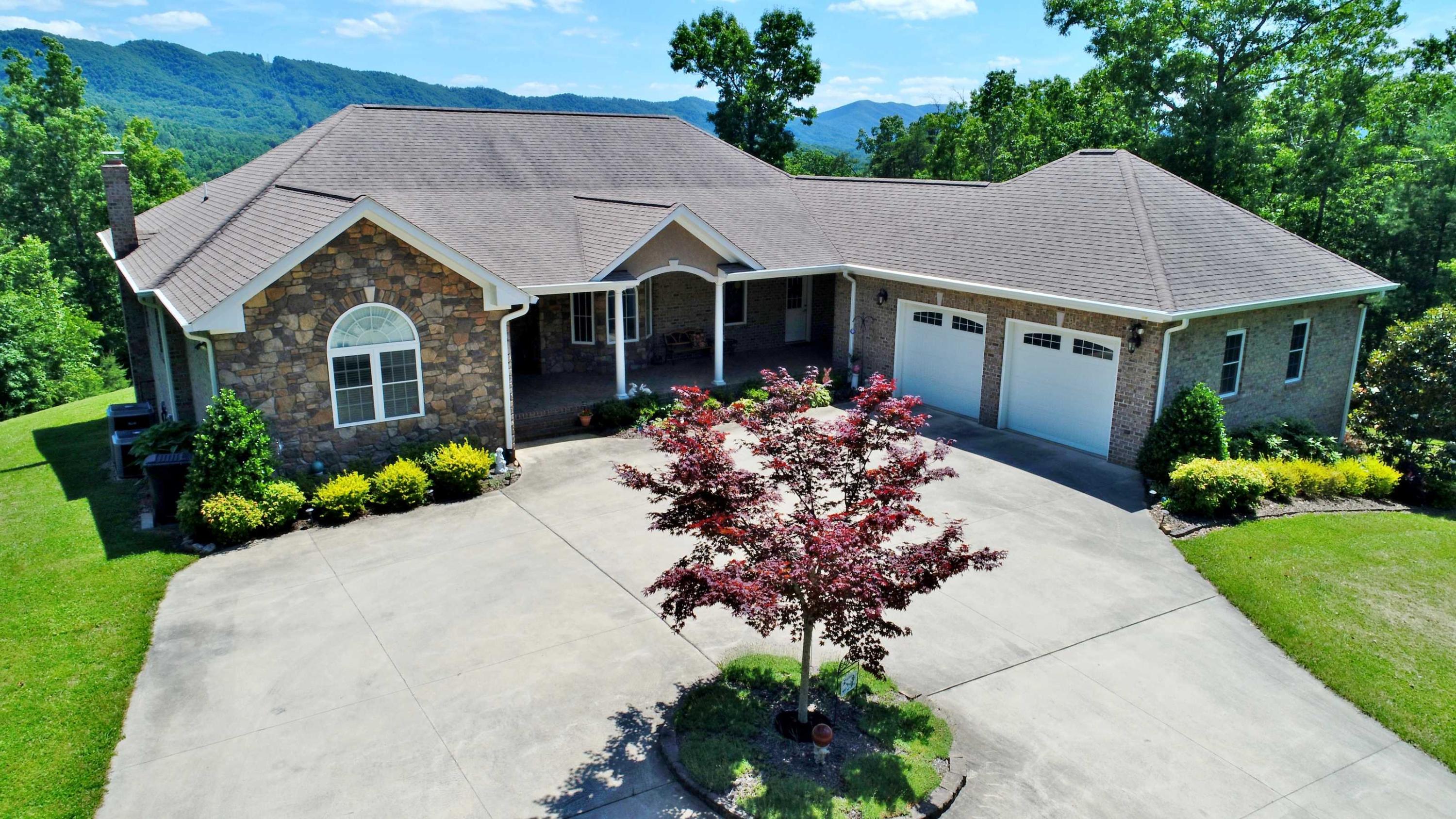 7988 Mayland Road Roanoke, VA 24014 - Photo 1 of 63 a front view of a house with a yard