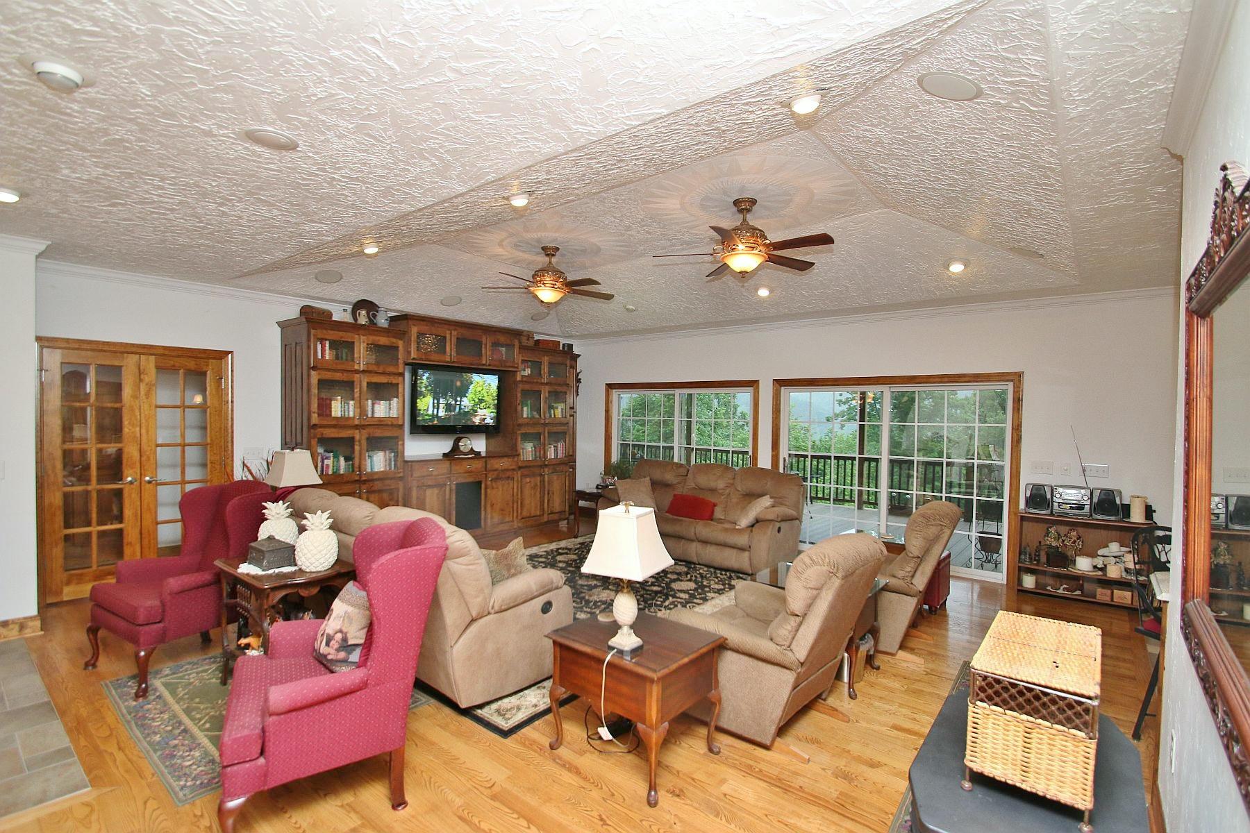 7988 Mayland Road Roanoke, VA 24014 - Photo 14 of 63 a living room with furniture and a large window