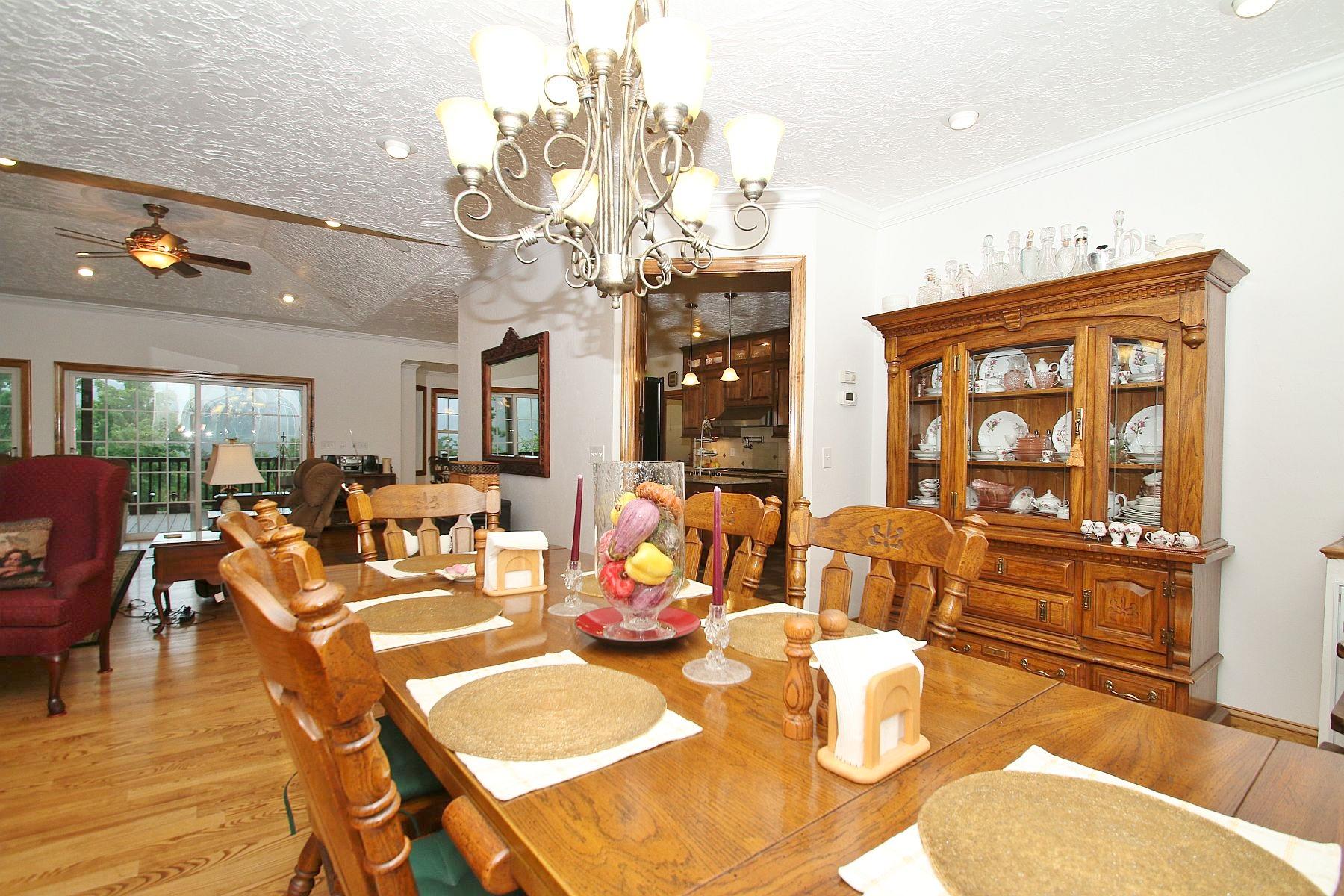 7988 Mayland Road Roanoke, VA 24014 - Photo 22 of 63 a living room with fireplace furniture and wooden floor