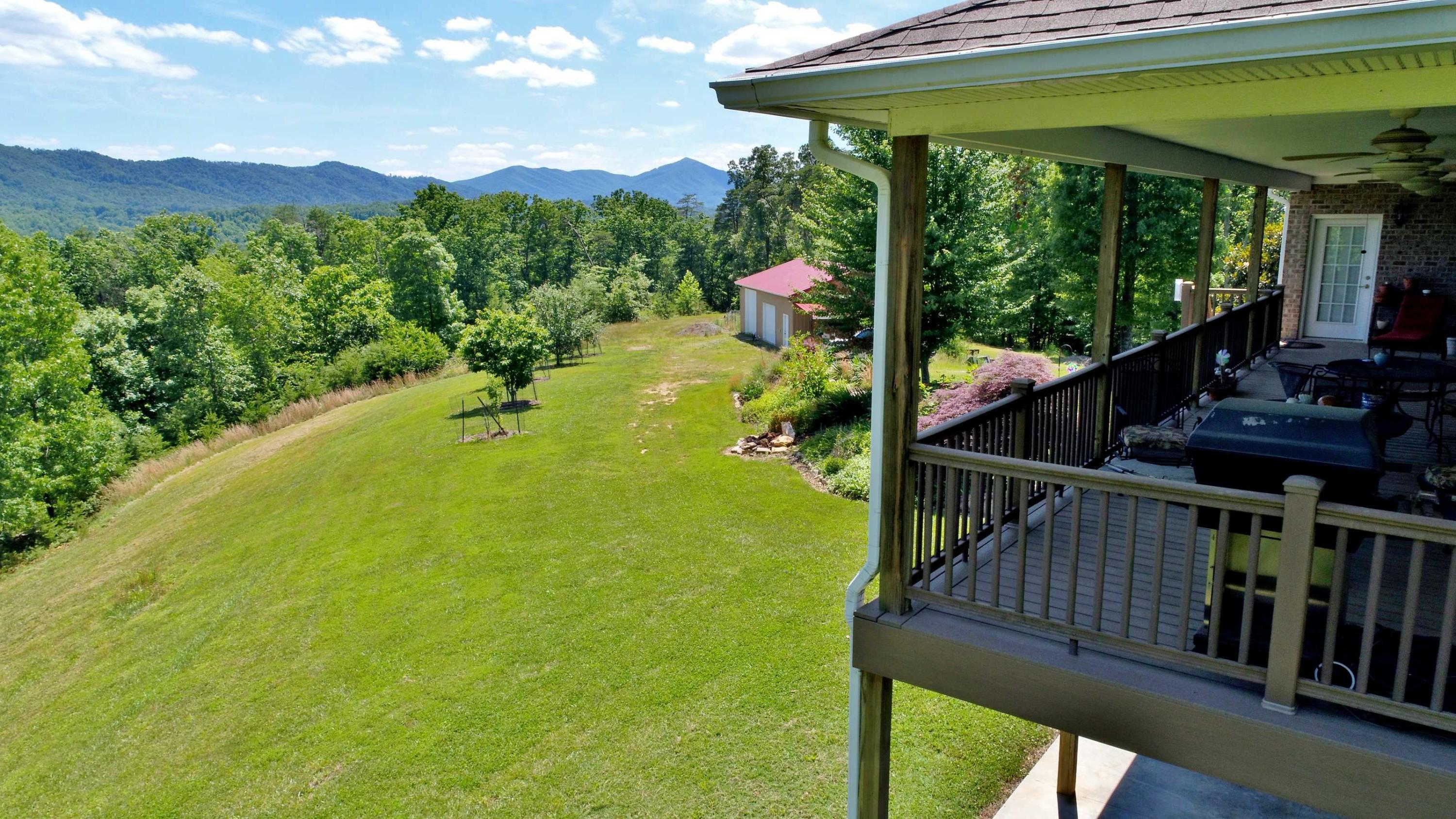 7988 Mayland Road Roanoke, VA 24014 - Photo 4 of 63 a view of a balcony with lake view and a mountain view
